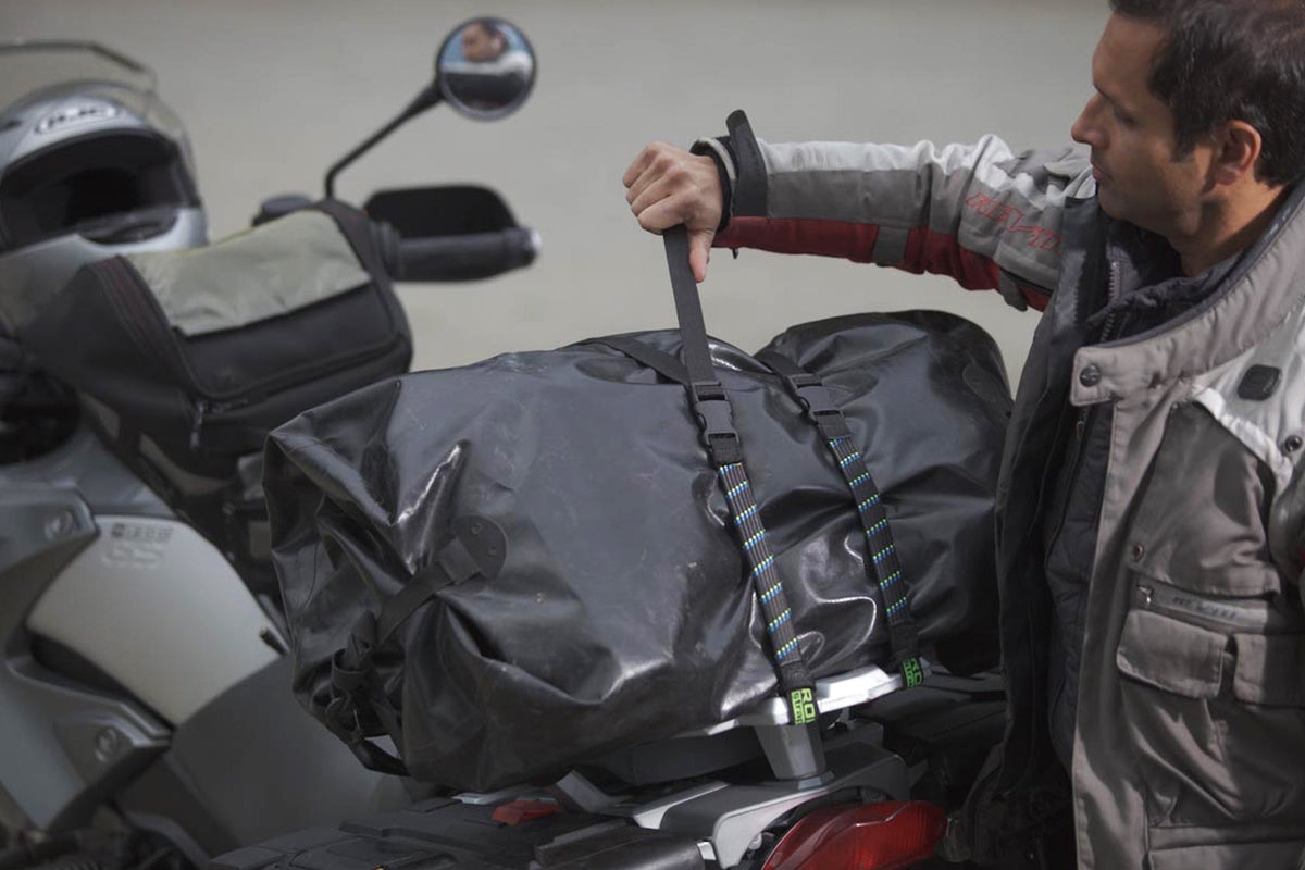 Motorcycle loaded with luggage secured by ROK Straps