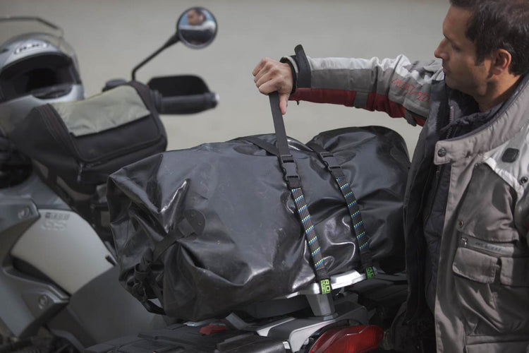 Motorcycle loaded with luggage secured by ROK Straps